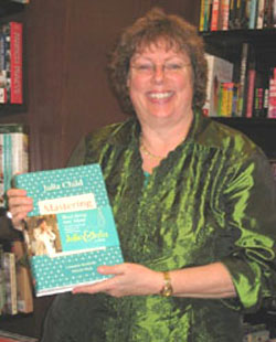 photo of Kate Dudding with Julia Child's first book